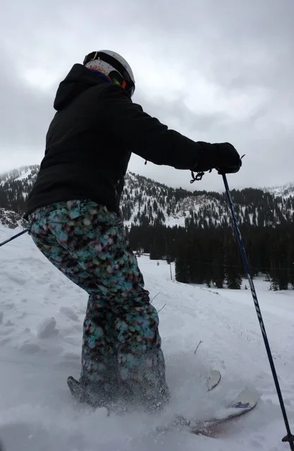 Sarah smashing the turns in the Alta powder in Utah, America.