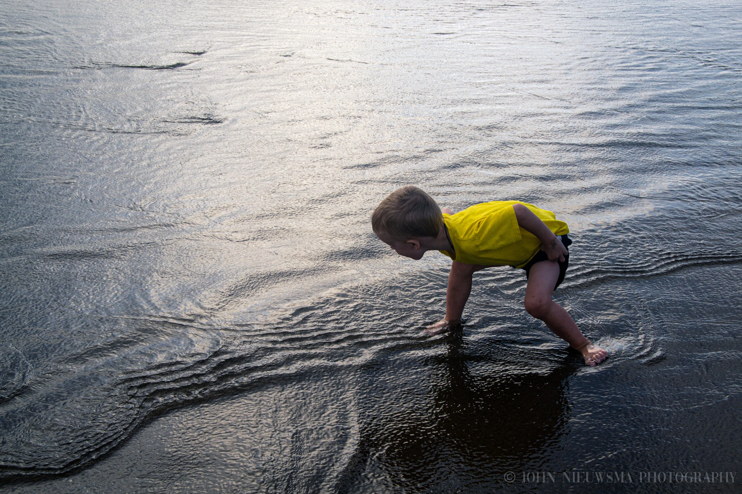 Joseph inspects the receeding Neahkahnie waves