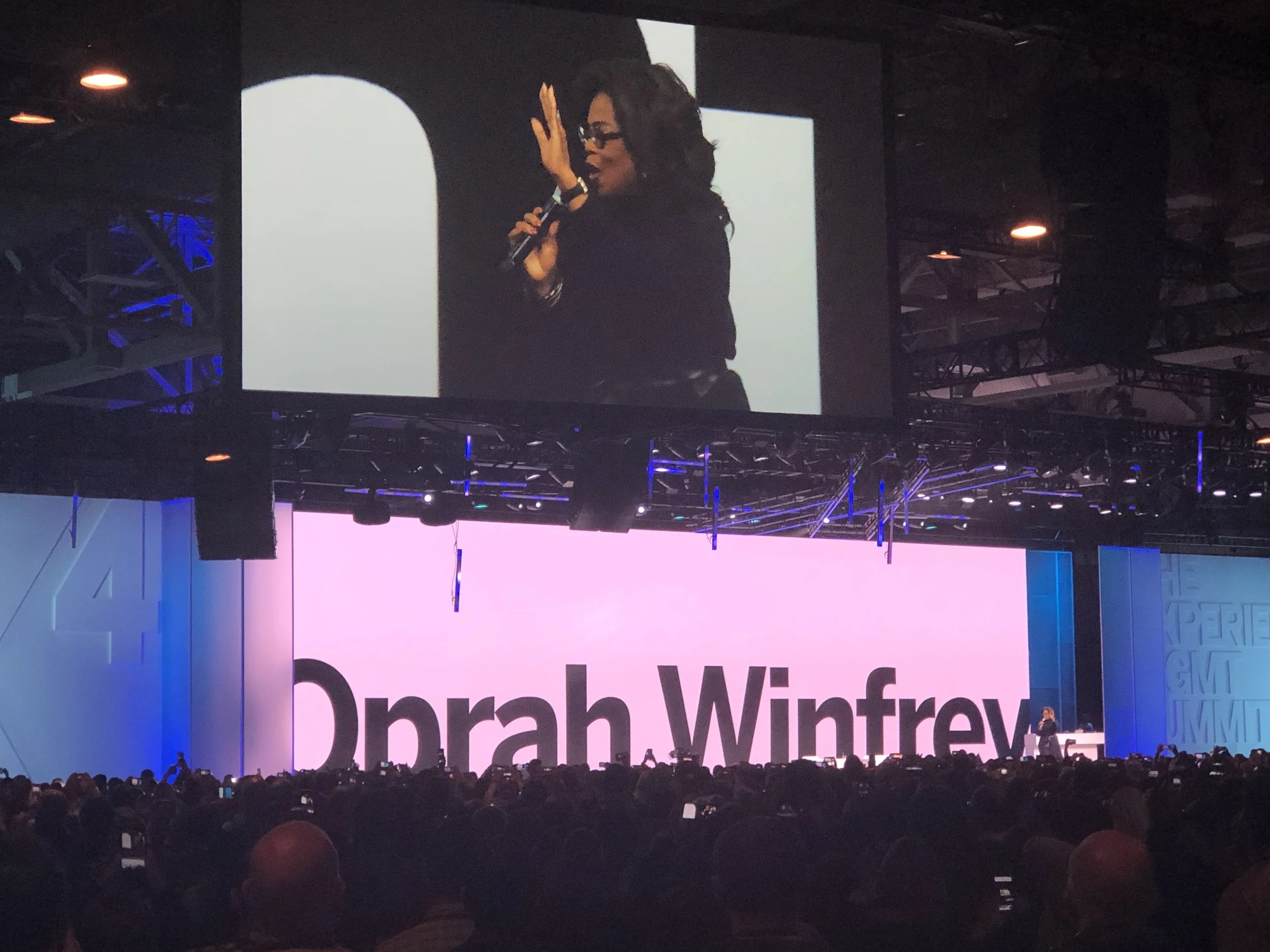Oprah Winfrey speaking at the conference.