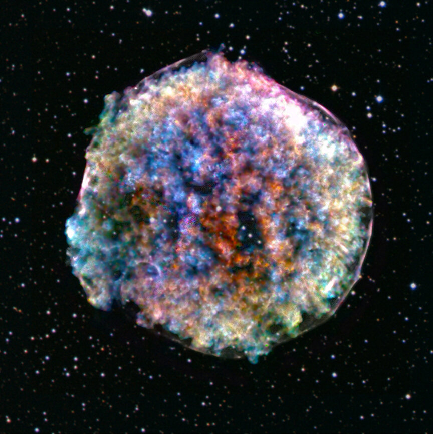 The Tycho Supernova Remnant, imaged by NASA’s Chandra Observatory. The supernova was first observed in 1572 by Danish astronomer Tycho Brahe. (X-ray: NASA/CXC/RIKEN & GSFC/T. Sato et al; Optical: DSS)