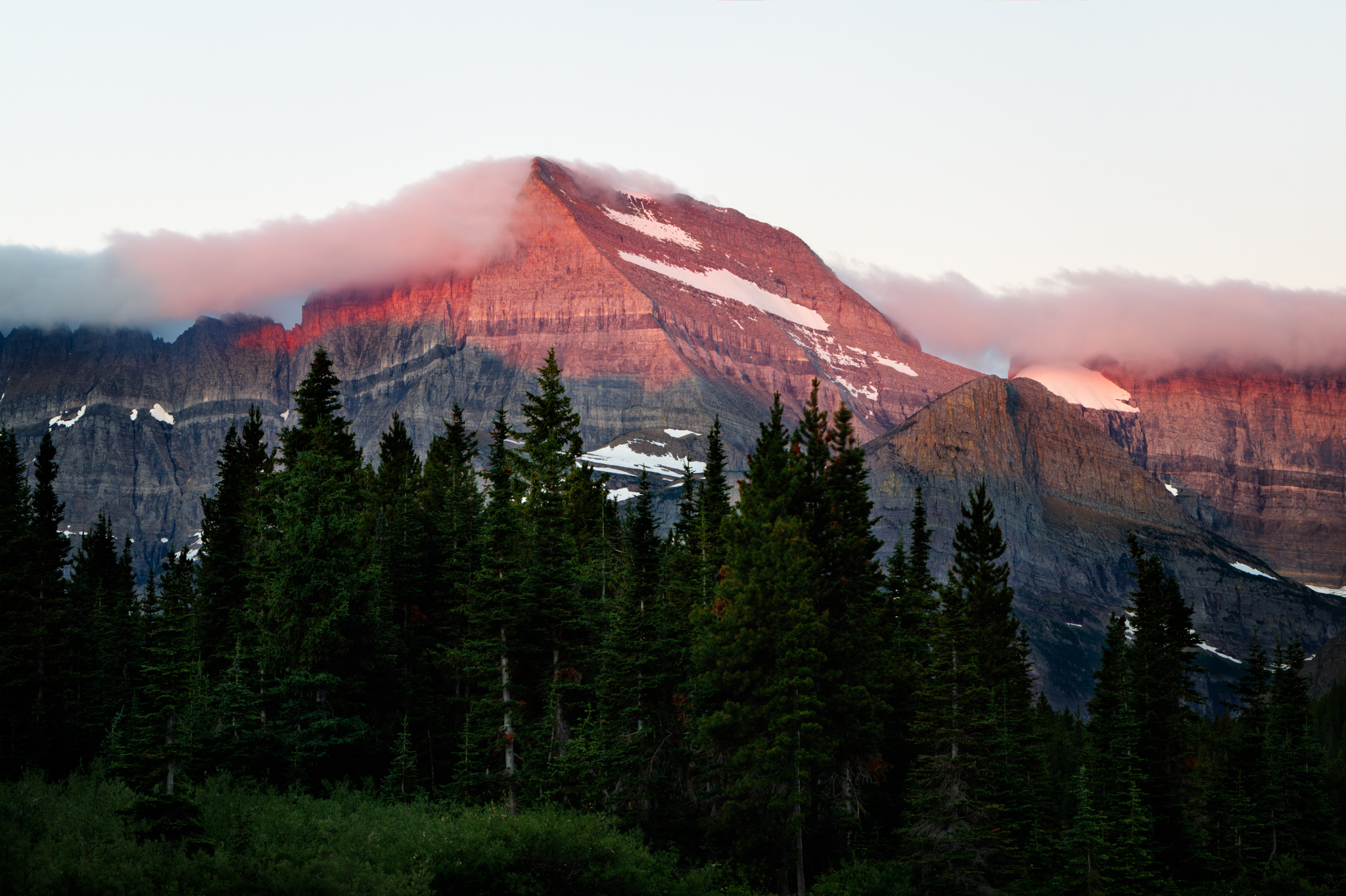 The magic begins as the alpen glow kicks in over Mt. Gould and the Garden Wall. Canon EOS 80D f/11 .6s ISO-100 59mm