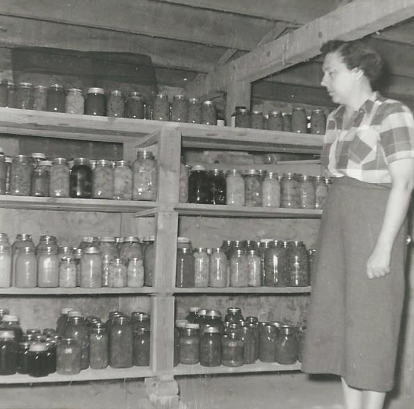 Claire's Grandmother (Nana) with her cans put up for winter