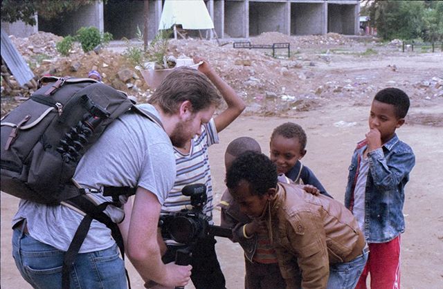 Showing some kids a video I shot in Africa. Also, this photo was shot on some expired Kodak gold 400 with a Pentax k1000. Hand developed and scanned at home. .
.
.
.
.
#35mm #filmisnotdead #film #analog #analogphotography #ishootfilm #photography #fi