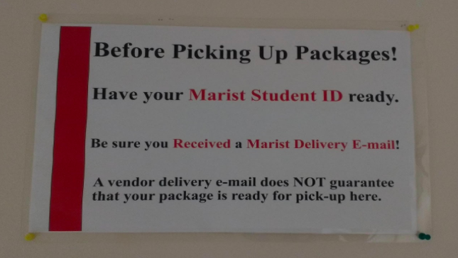 The new sign at the post office indicates that students should have their student ID ready when coming to pick up packages. SOURCE: CAROLINE CHAN