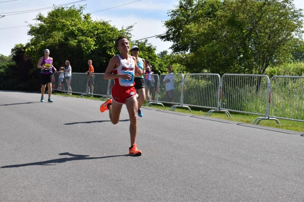 Spencer Johnson, finishing first in the Walkway Marathon in a time of 2:39:32, completing his first ever marathon.