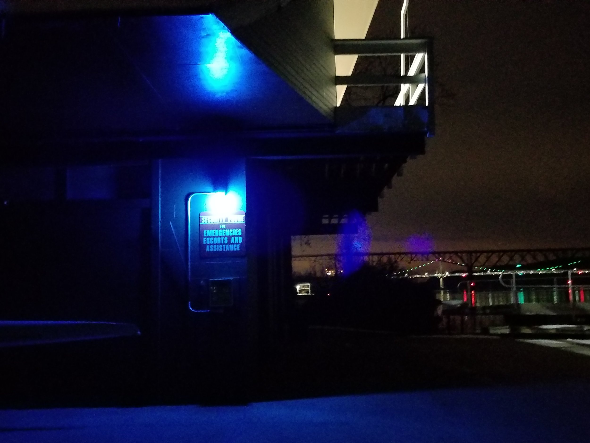 The callbox is not visible in its own blue-light and darkness.