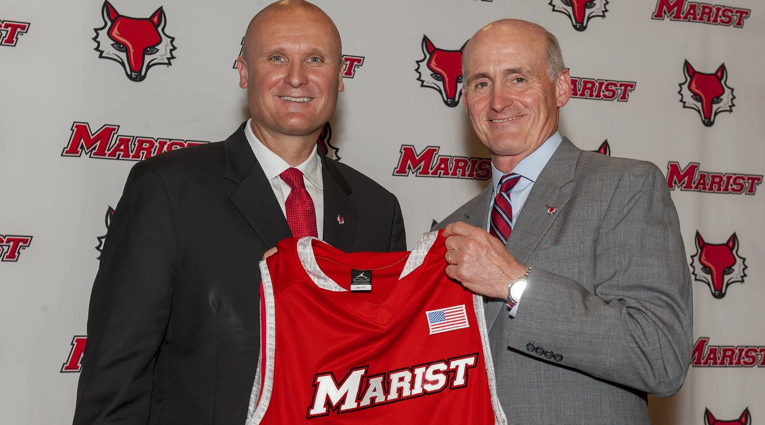 Former Marist College Men's Basketball head coach Mike Maker (left) welcomed to Marist by Director of Athletics Tim Murray (right) in 2014. Photo courtesy of Marist Athletics. 