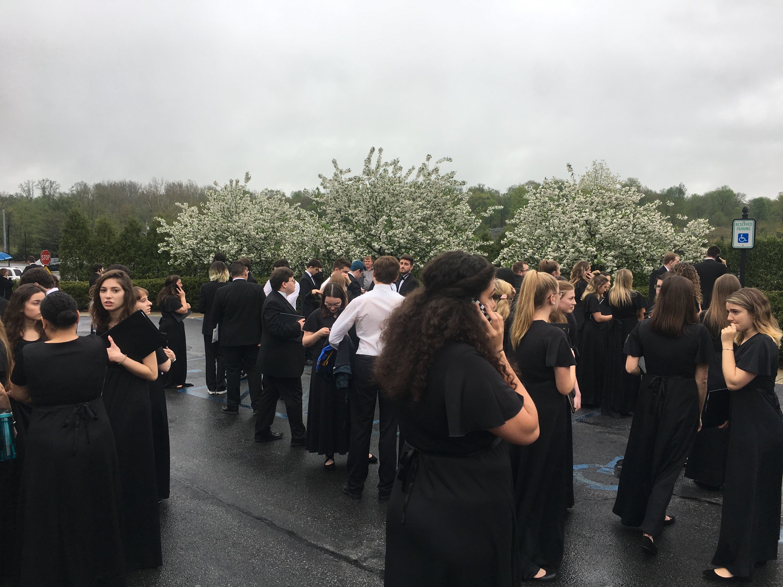 The Marist Singers waited outside in a parking lot adjacent to the Marriot Pavilion following Asiedu’s actions. Photo courtesy of Alexandria Watts.