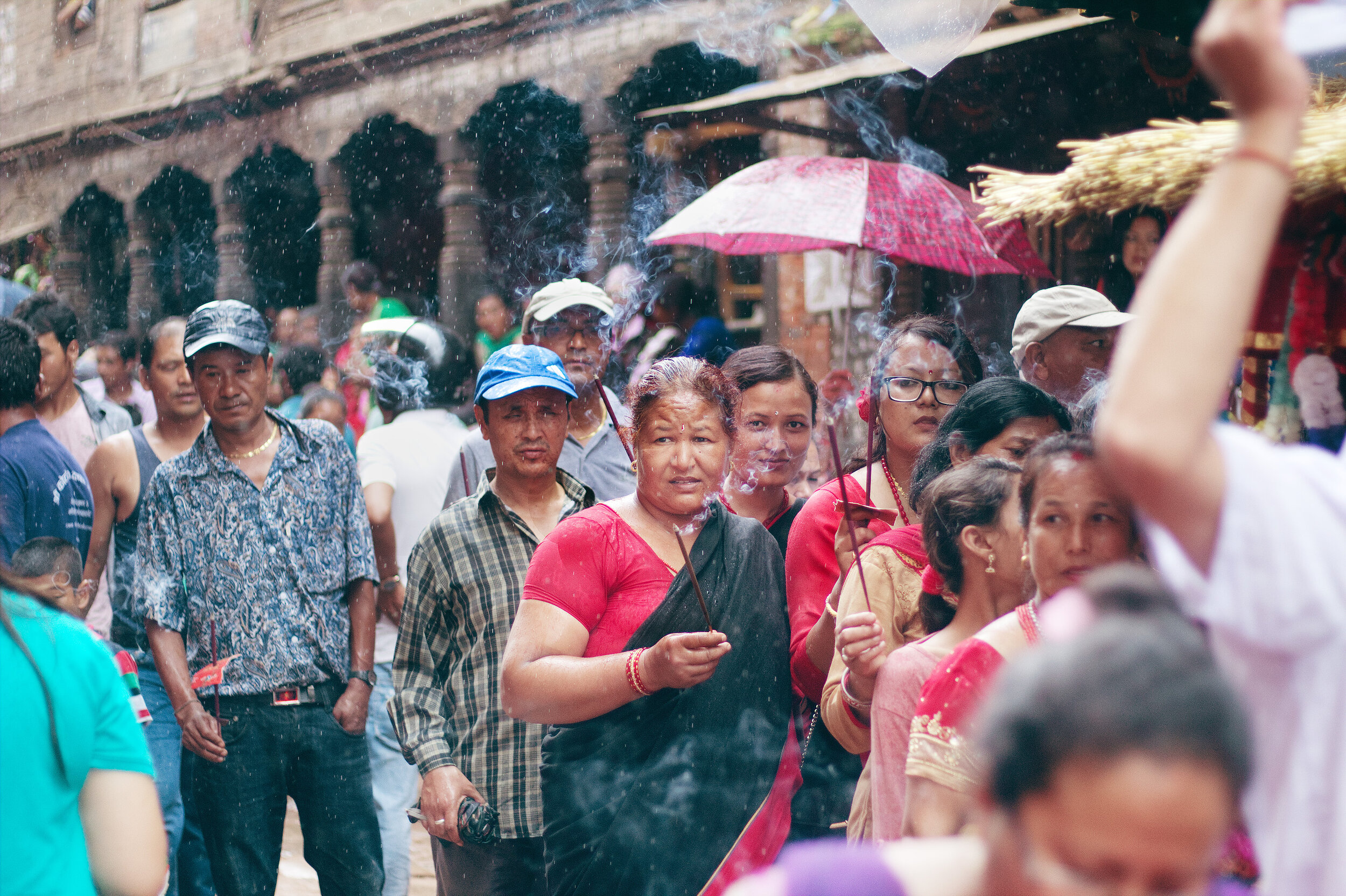 7 Incense women in rain.jpeg