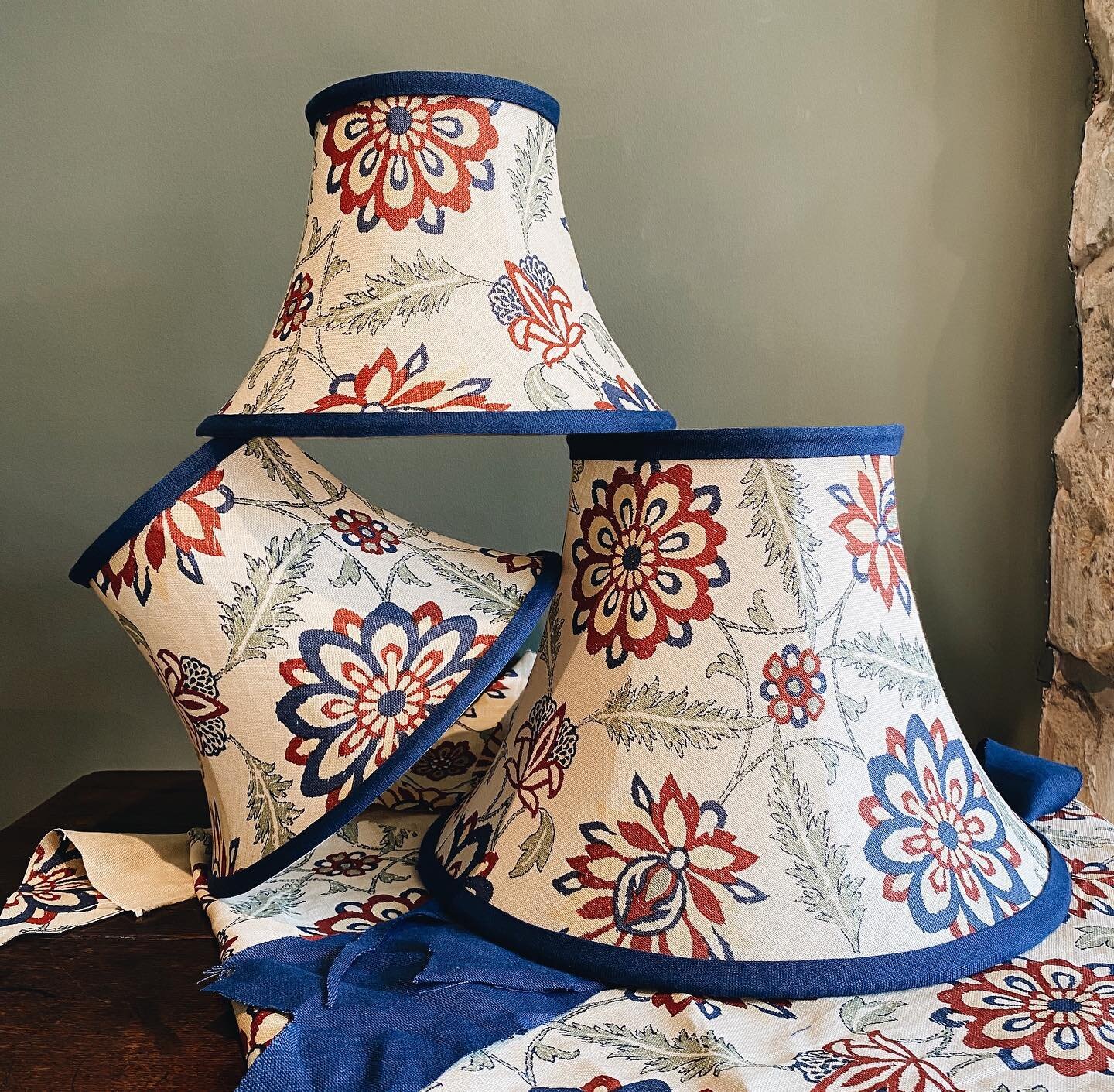 A trio of lampshades completed. 

These tailored bell shades are finished in Robert Kime&rsquo;s &lsquo;Mughal Flower&rsquo; linen with a dyed linen trim to pick out the blues of the fabric. 

These particular shades have now sold but there&rsquo;s a