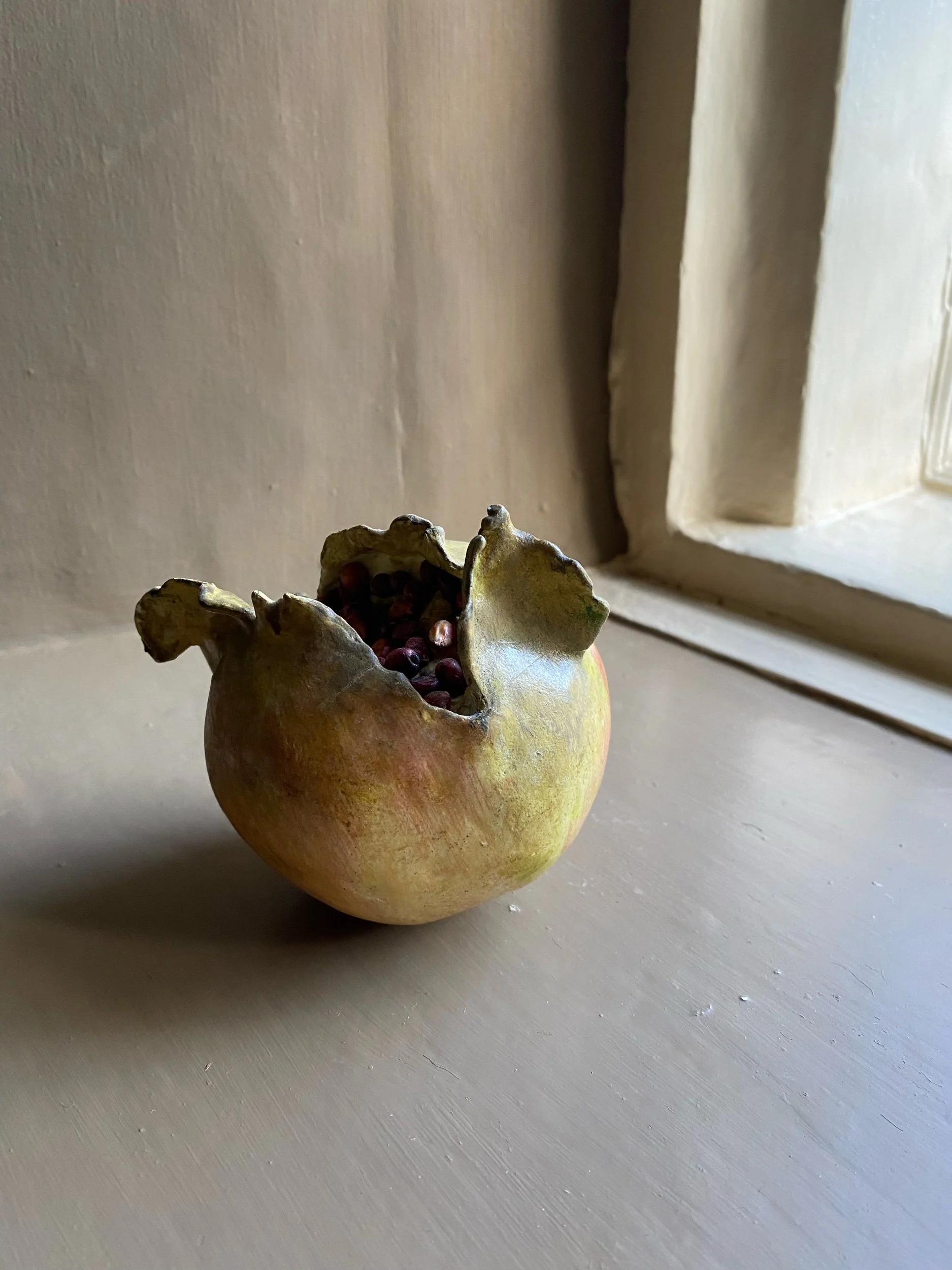Realistic Study of a Pomegranate in Painted Plaster