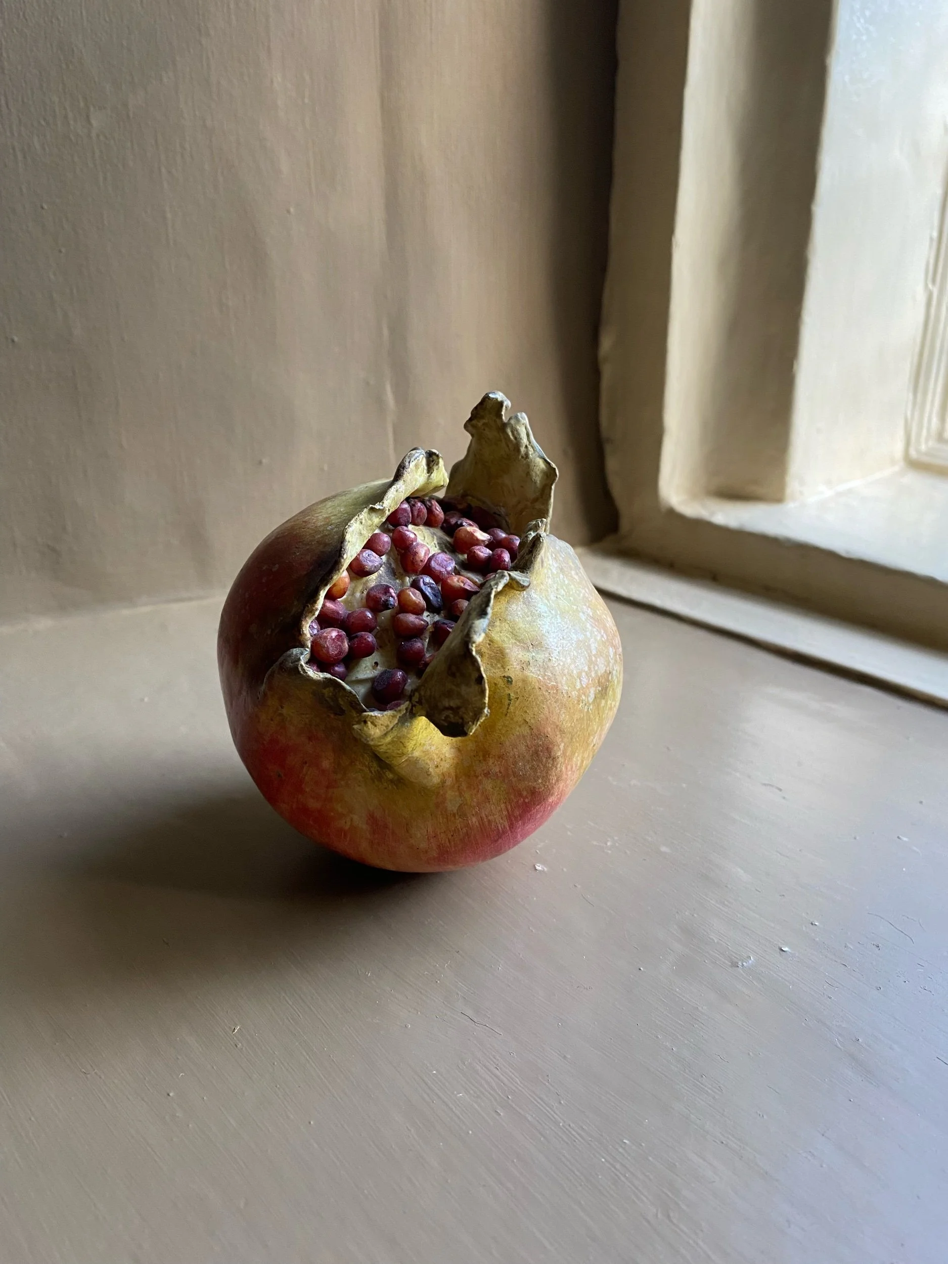 Realistic Study of a Pomegranate in Painted Plaster