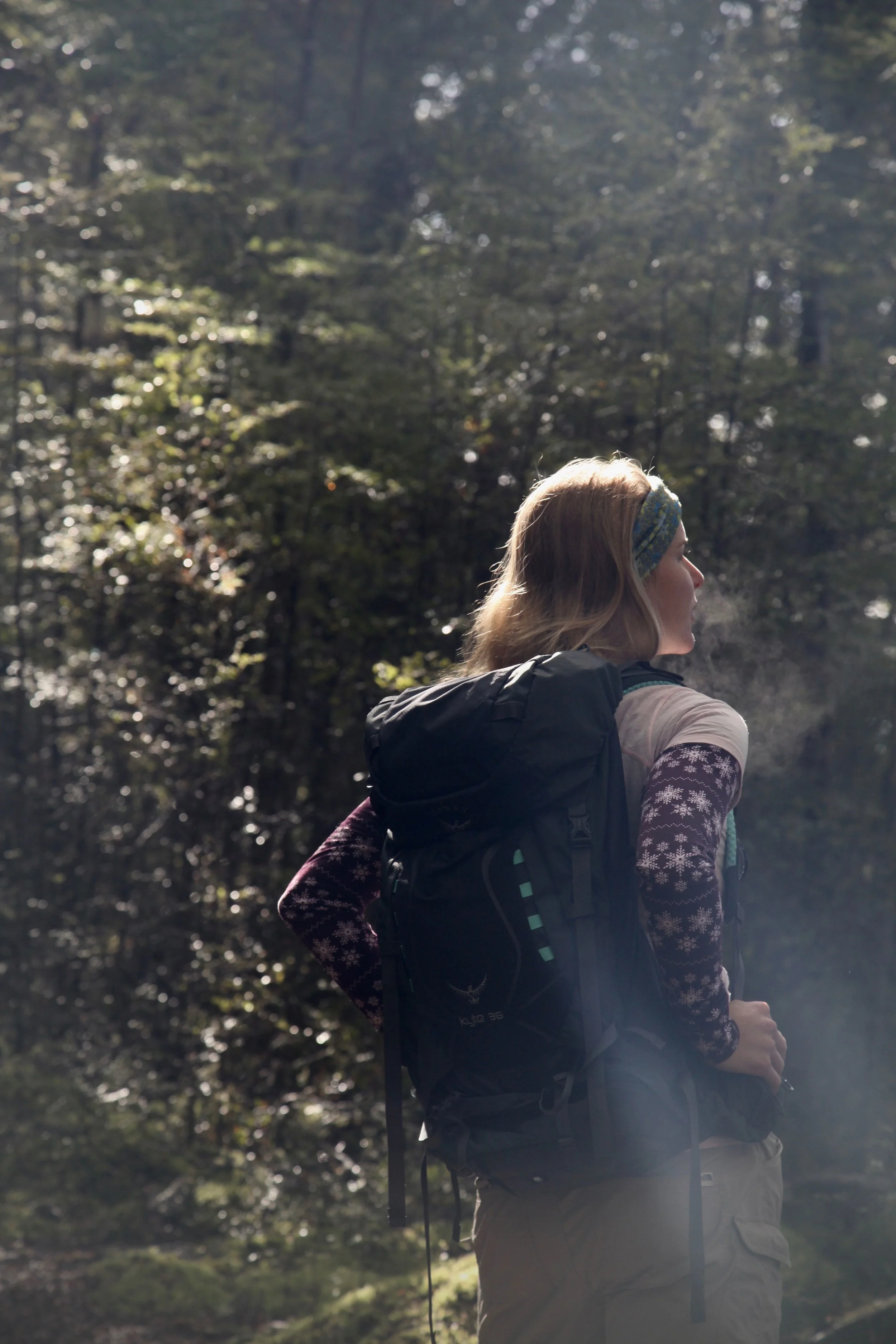 Women Want Adventure founder Monique takes a moment to enjoy the morning light.