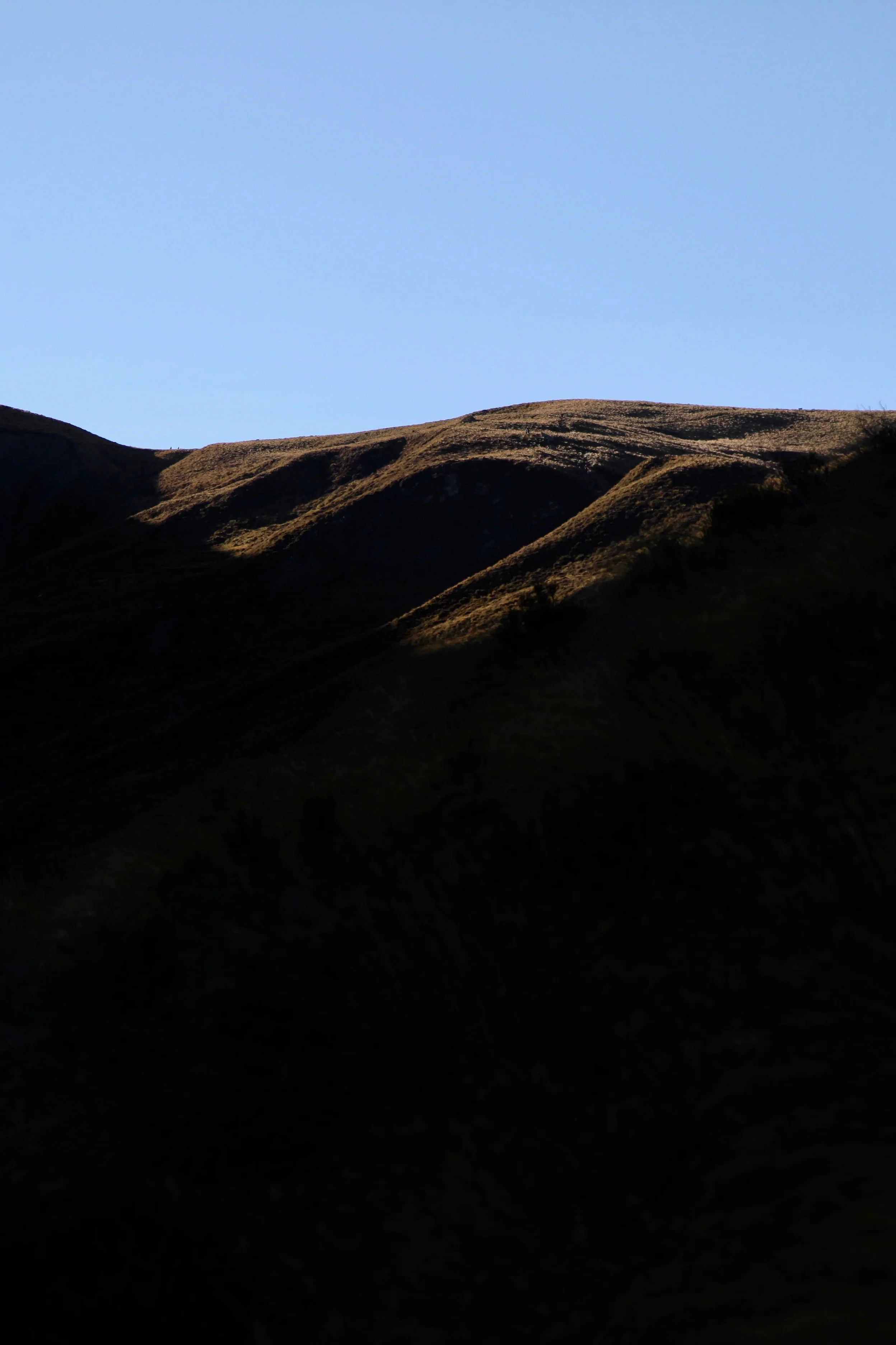 Afternoon shadows on the mountains in Queenstown, viewed from the Ben Lomond track.