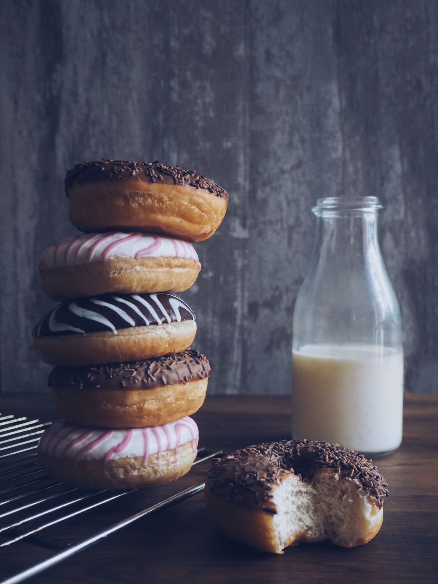 Stacked doughnuts and milk