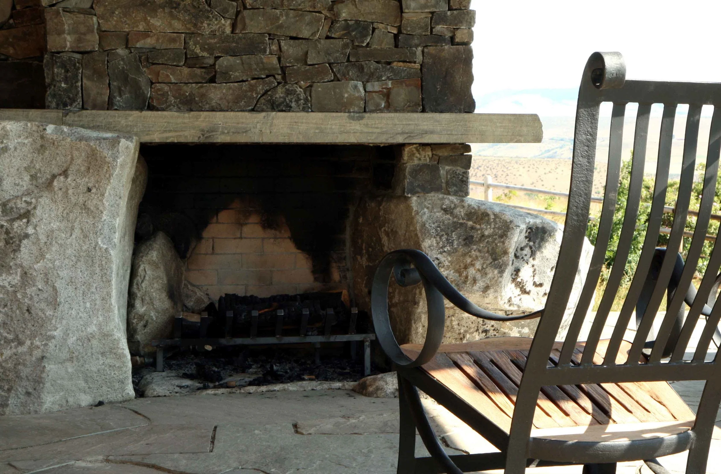 68 poore thorpe fireplace with chair.jpg