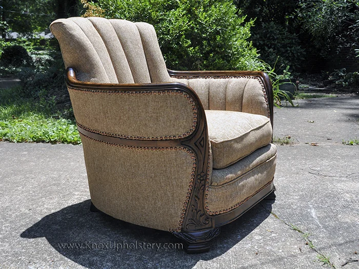 Antique Channel back upholstered barrel arm chair