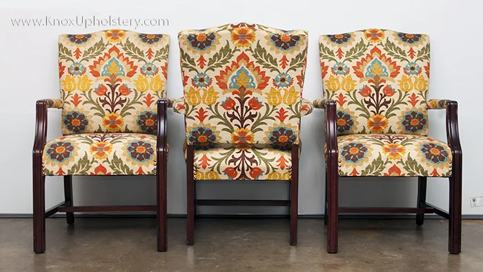 Colorful upholstered arm chairs