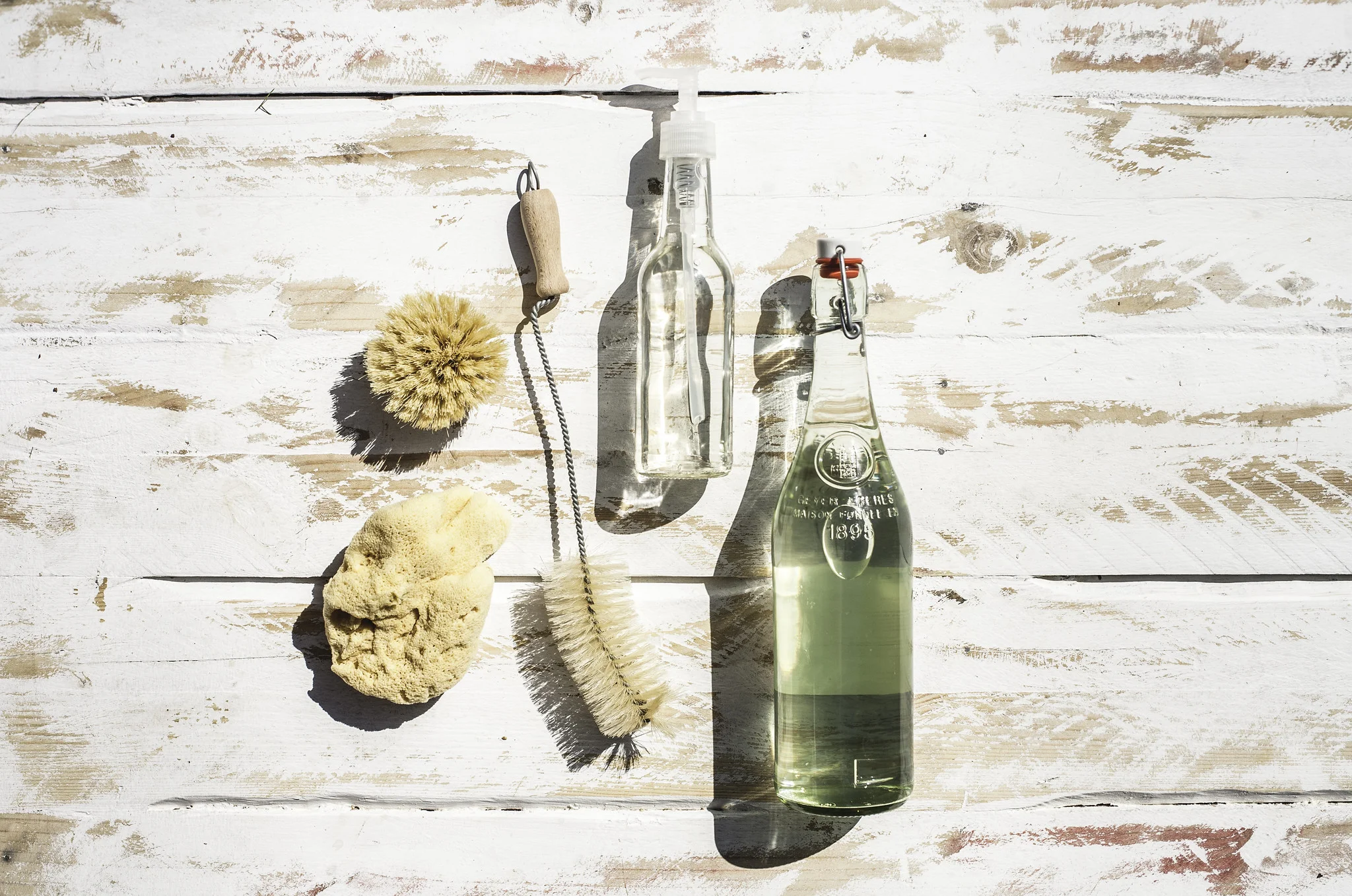 We use biodegradable soap for the kitchen and washing the van, bought in bulk using recycled lemonade and soy sauce bottles! We use a natural bristled bottle washer, pot scrubber and just started using a sea sponge we picked up in Croatia for wiping surfaces and washing the dishes.