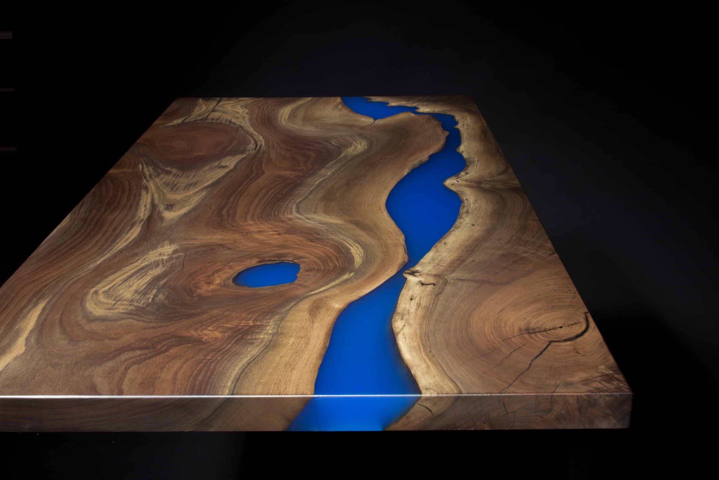 blue epoxy resin river table desk