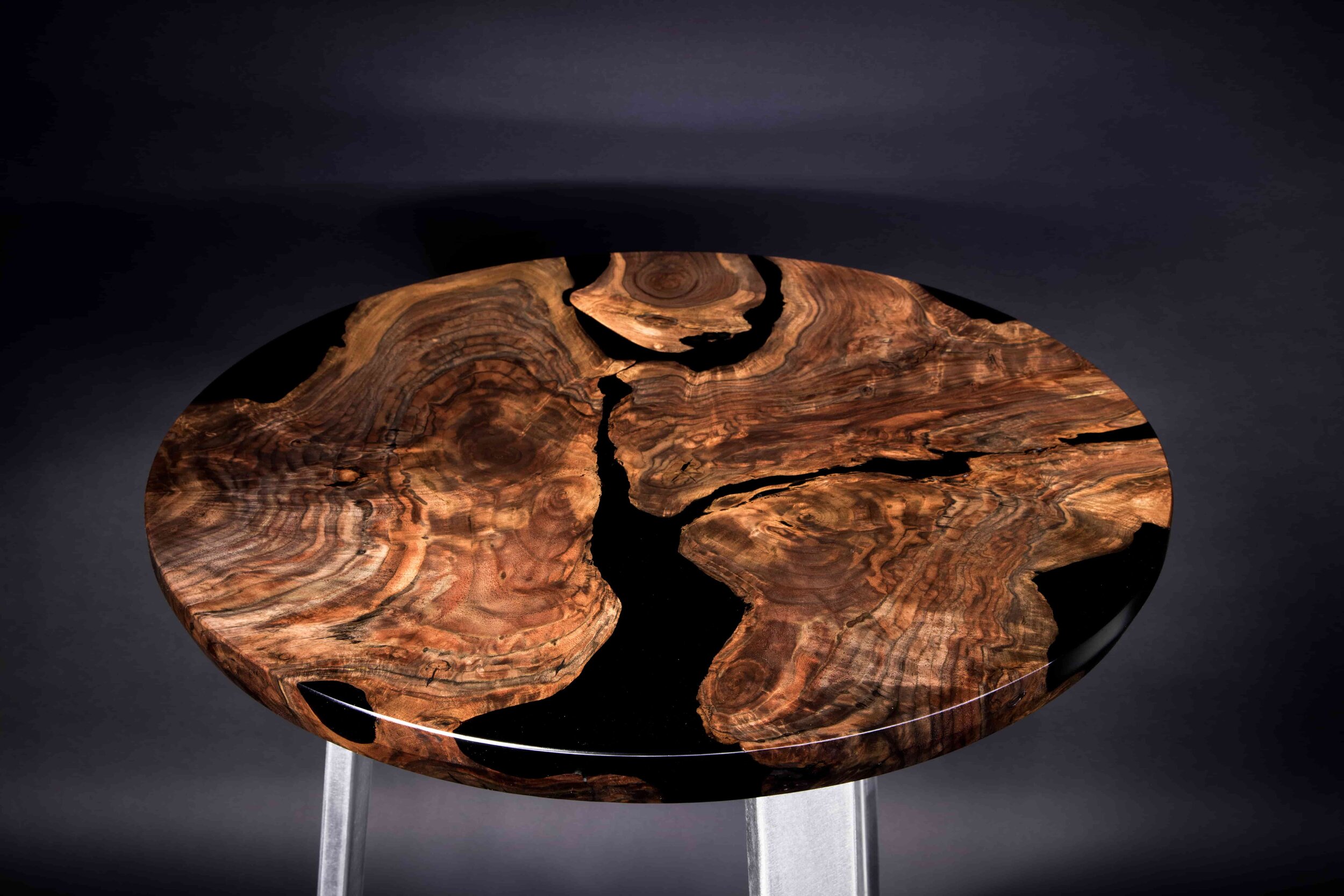 round black epoxy walnut root slab table