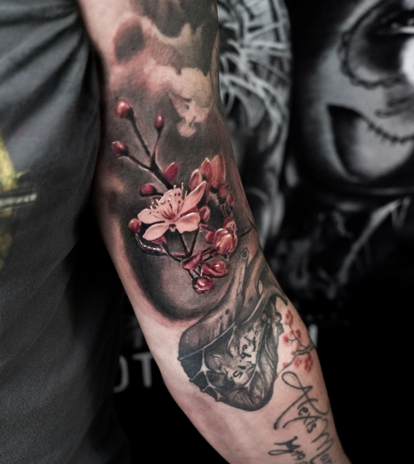Photorealistic flower tattoo by Scoot Ink