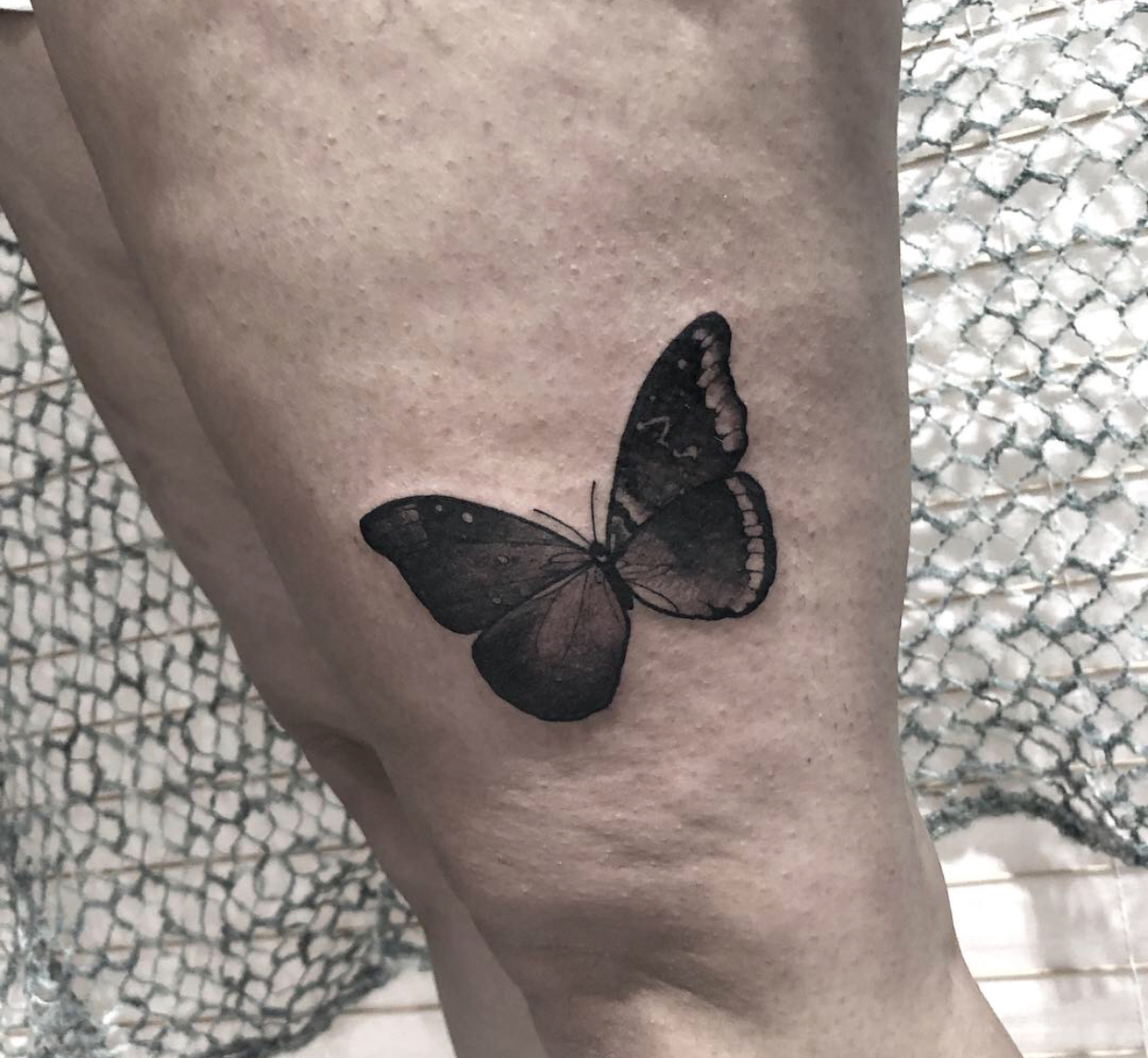 Blackwork butterfly tattoo by Katt