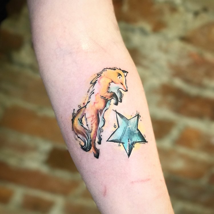 Watercolour fox tattoo by Nico