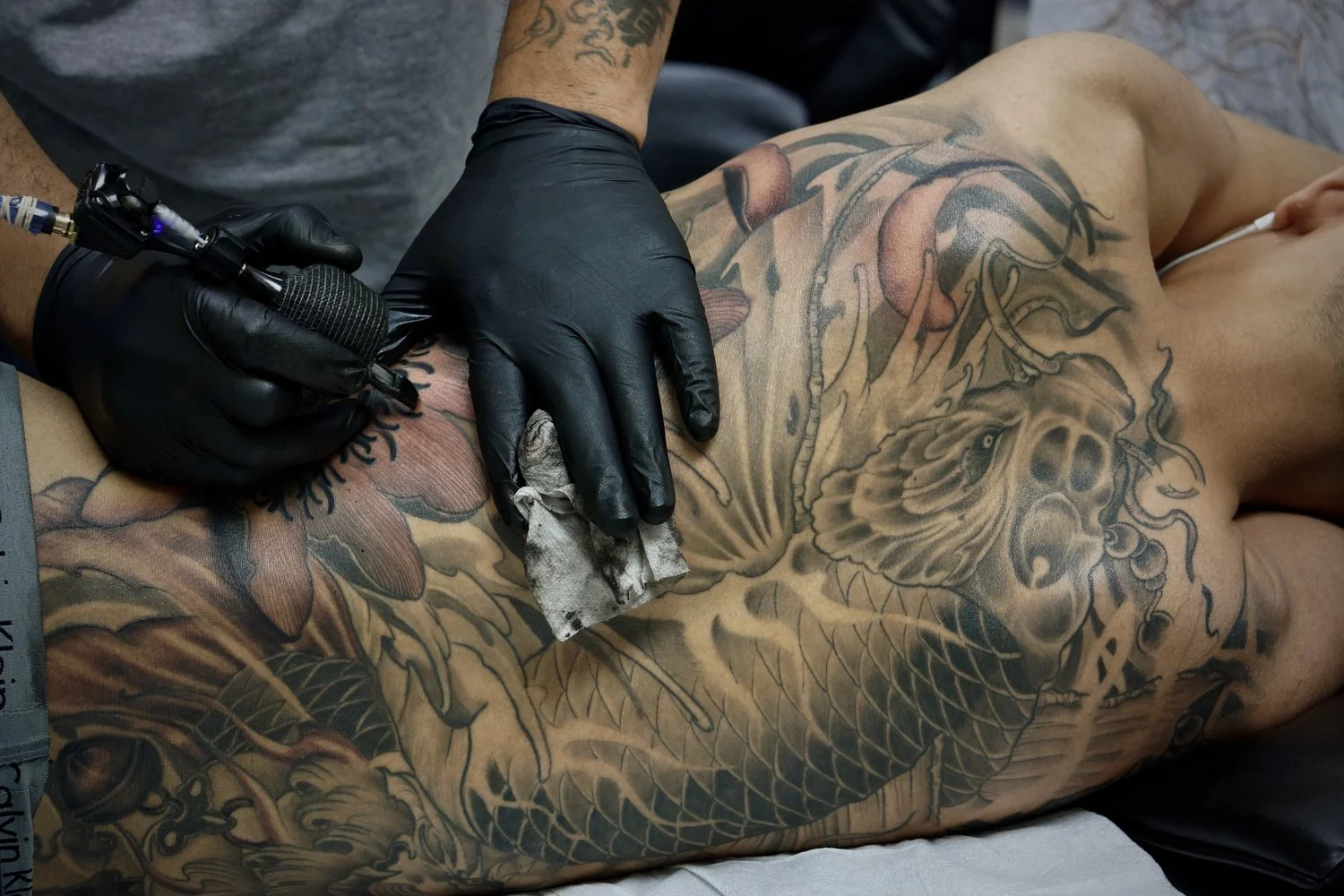 Shark is an asian style tattoo artist in Toronto. Find him on pick the ink. @master__shark.