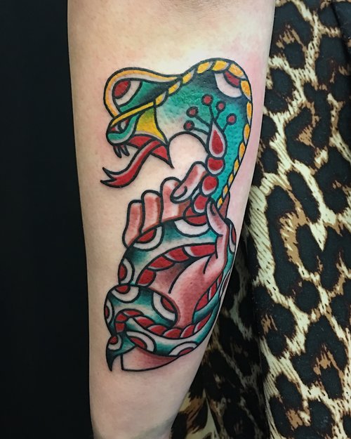 Traditional snake tattoo by German