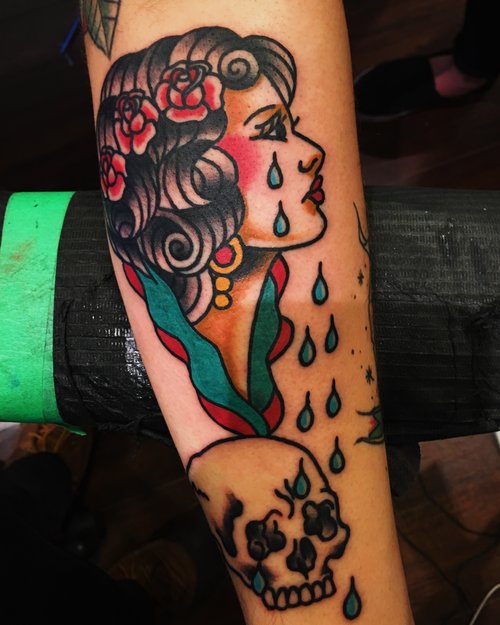 Traditional crying woman tattoo by German