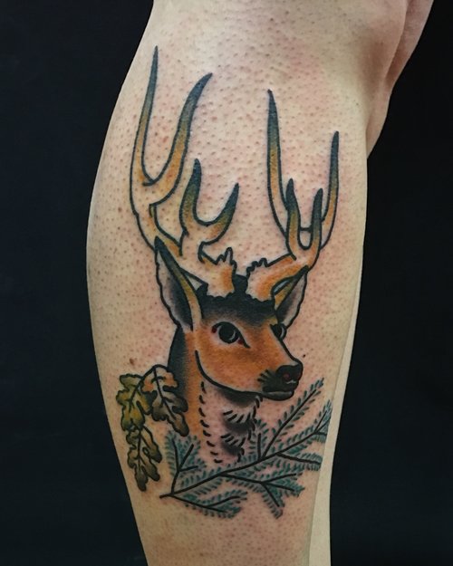 Traditional deer tattoo by German