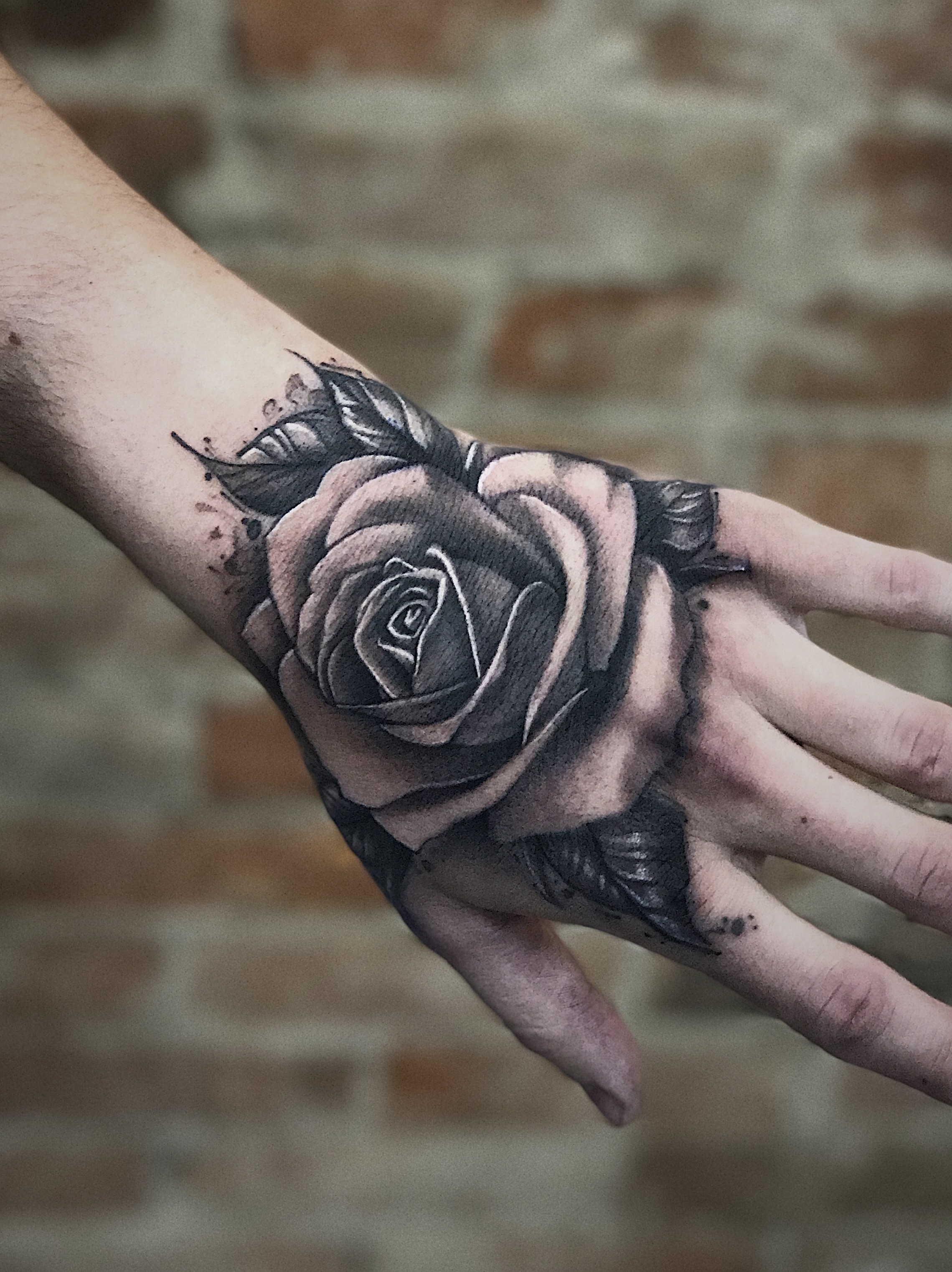 Realistic rose tattoo