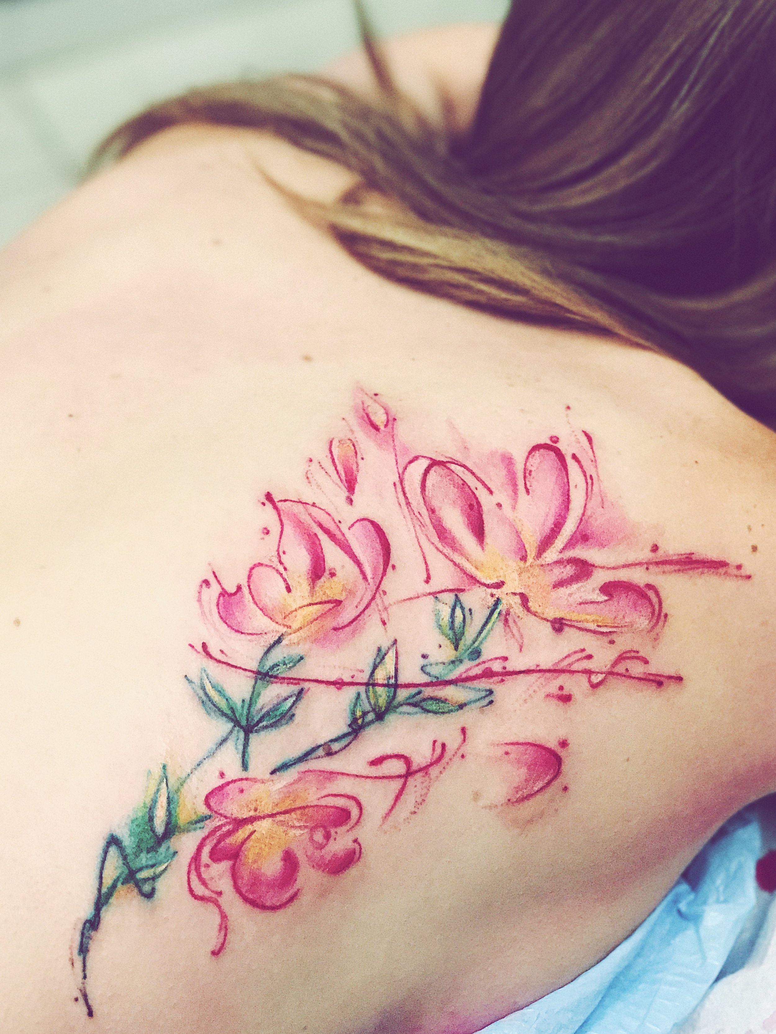 Watercolour orchid tattoo 