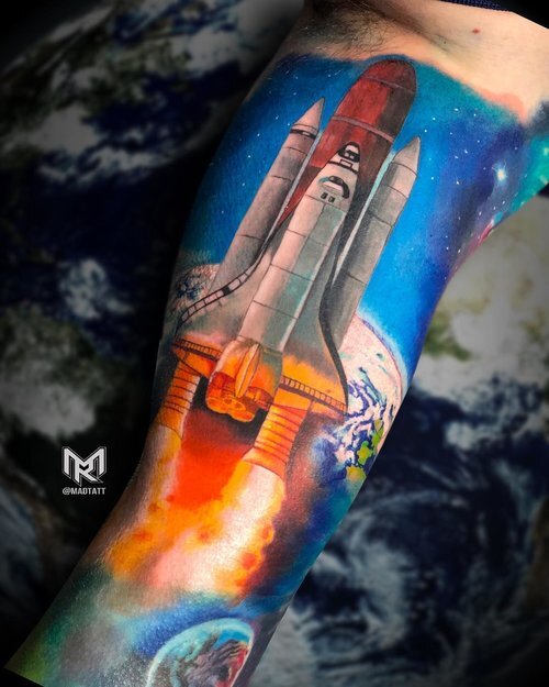 Colour realistic rocket launch tattoo