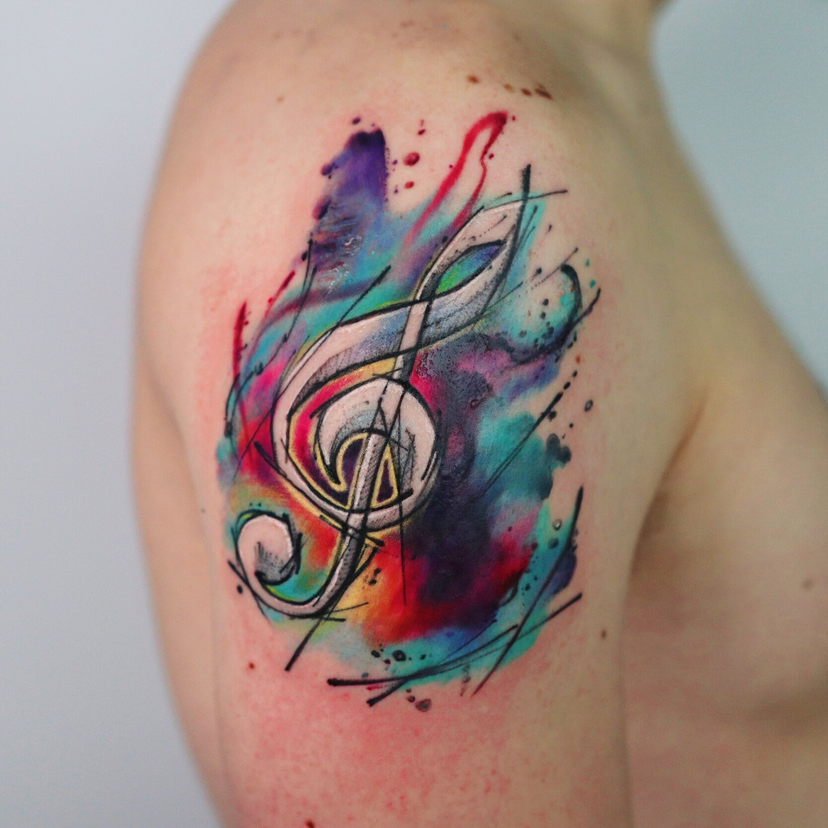 Watercolour music note tattoo by Nico