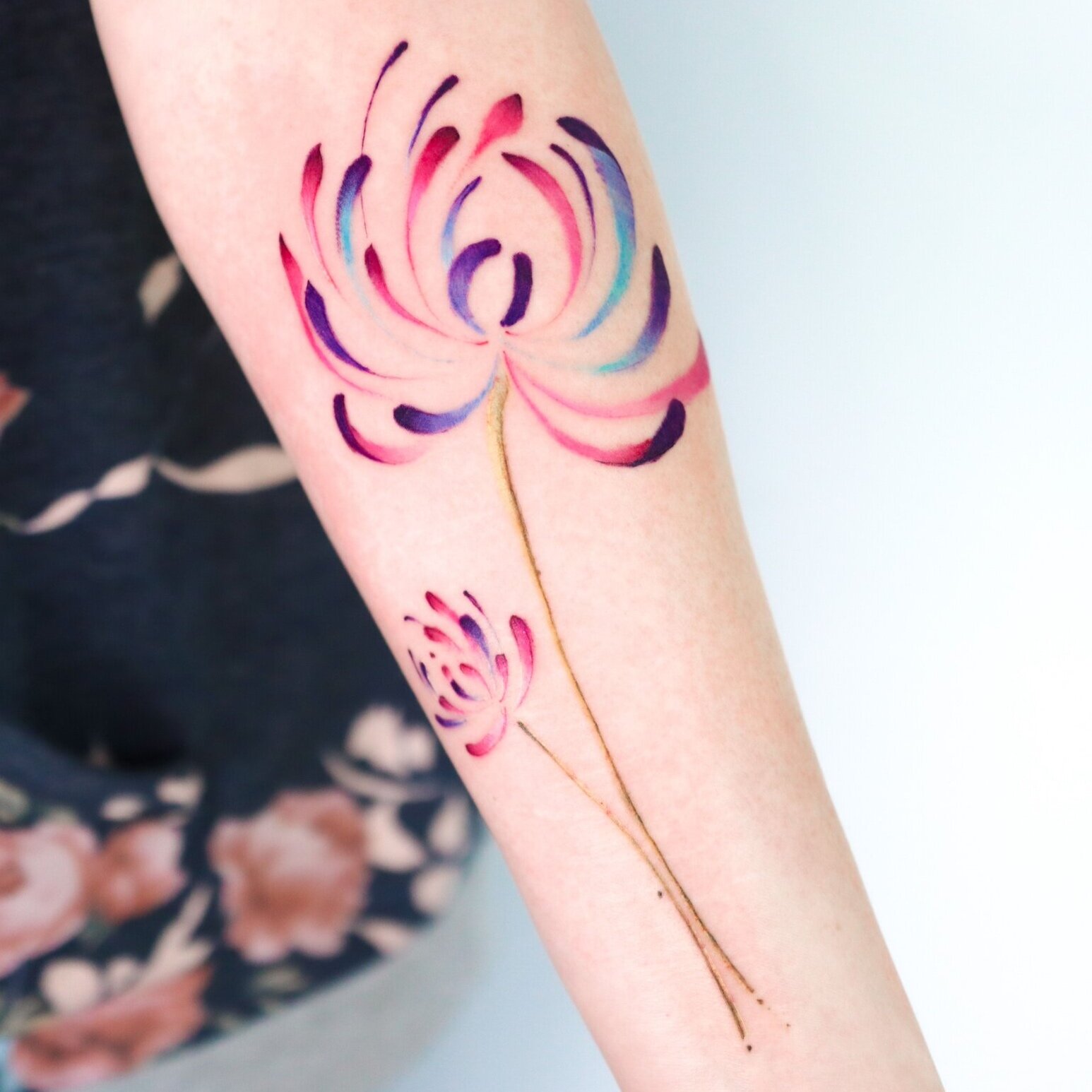 Watercolour flower tattoo by Nico