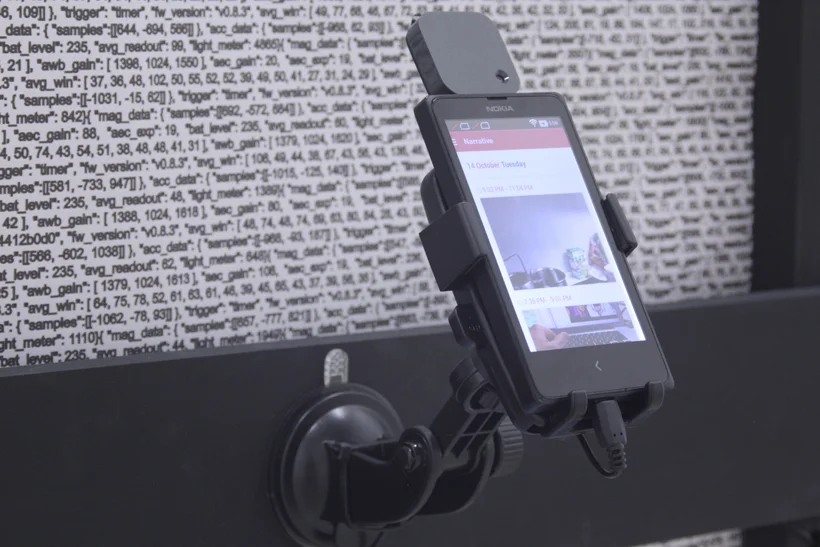 Narrative Data, Inkjet Print on Wood, Cell Phone, Narrative Clip, Narrative Clip app, and Cell Phone Holder.