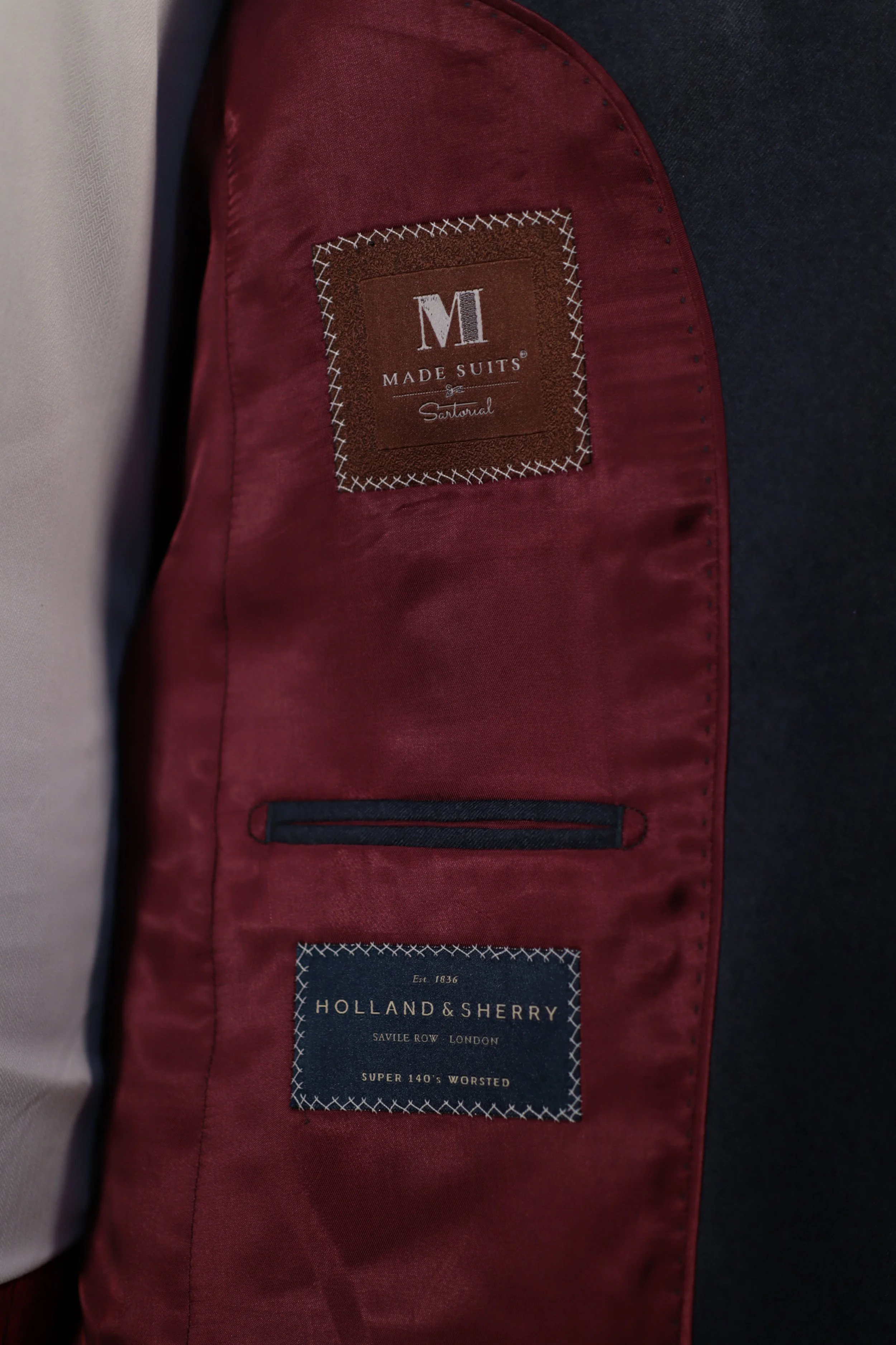 the Savile Indigo Made suits holland & Sherry chequers Labels.JPG