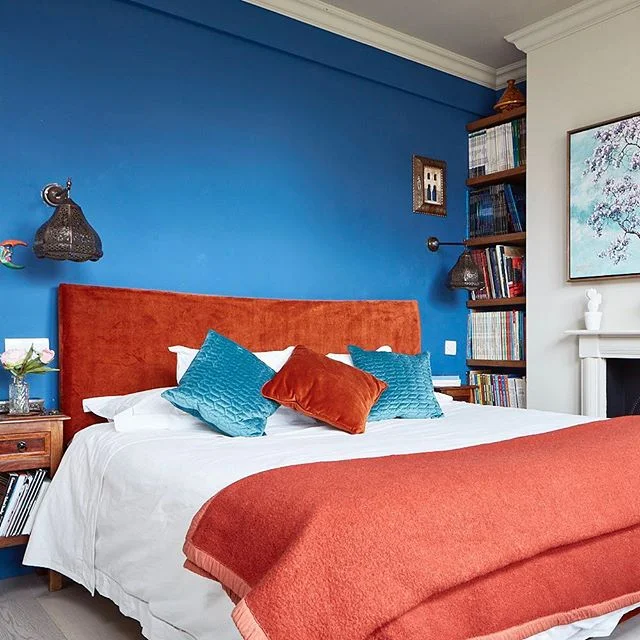 The #masterbedroom has a #moorish feel to it with #arabic #morrocanstyle #walllights and #pendantlight - and as a #graphicnovel fan, I needed #shelves to display some of them in the corner. The #secretaire is an #antique - #bedroomdesign #bedroomdeco