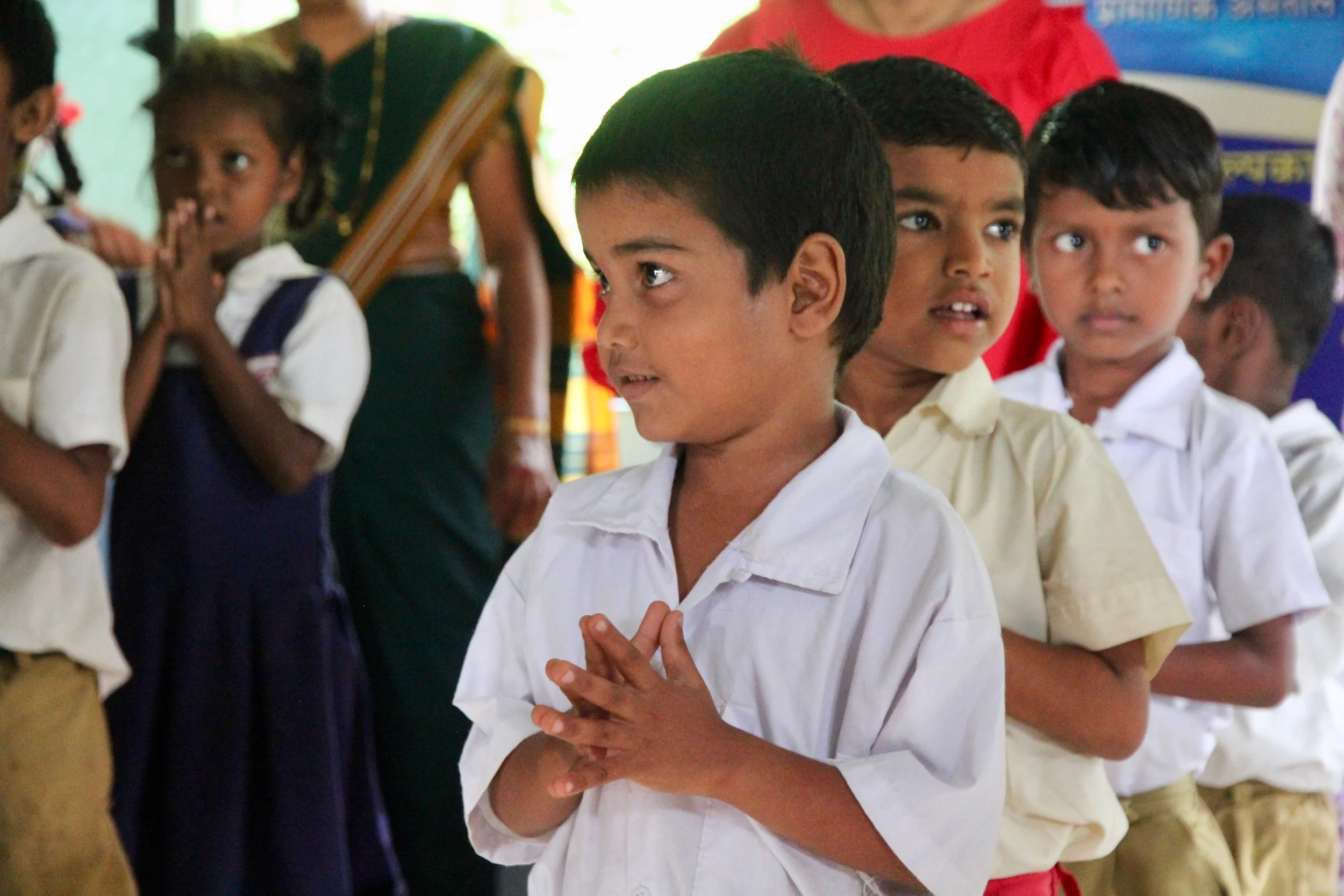 Before distribution, the children would sing songs and recite poems.