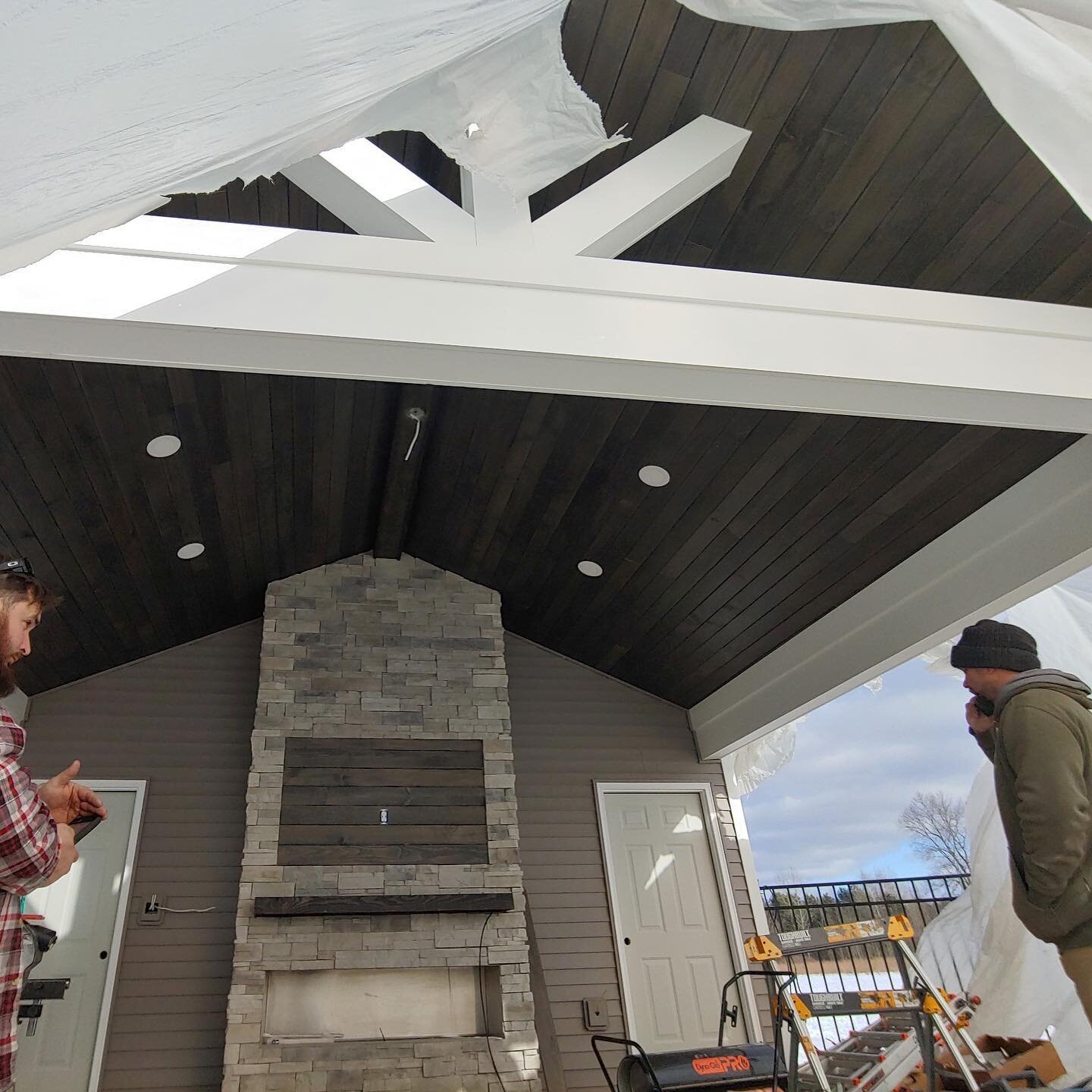 Custom propane fireplace in the front of this pool side pavilion / bath house.  Structure features a changing room and full bath.  We have temporary doors on the structure to maintain heat inside.  New custom front doors selected by the client will g