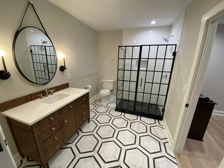 Custom bathroom remodel Syracuse with glass shower and hexagon tile floor
