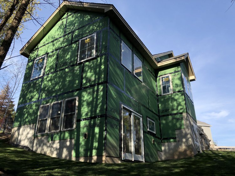 Home addition contractor Syracuse NY framing and sheathing a house addition