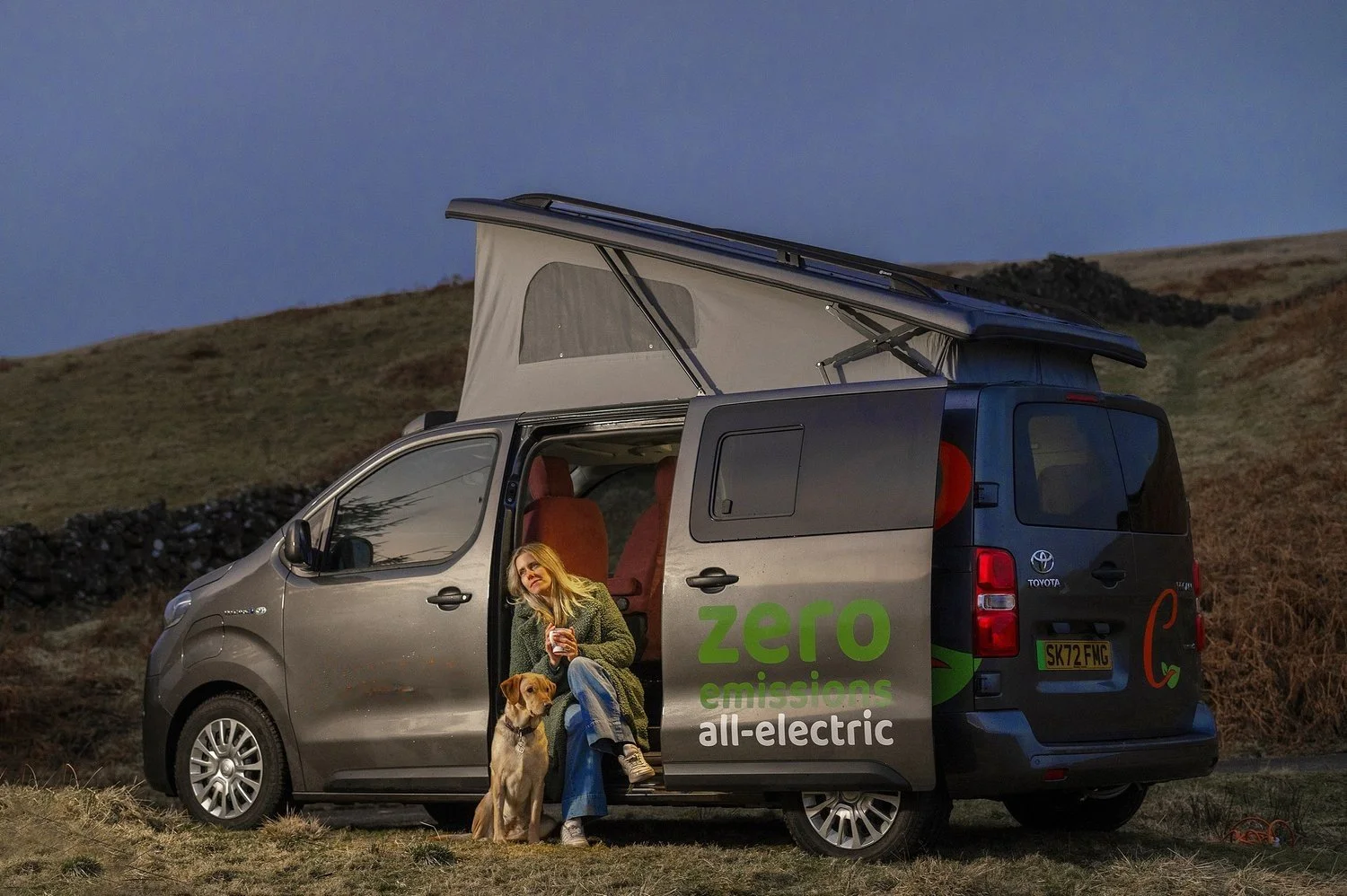 Eco+Revolution+Electric+Camper++side+with+dog+lady+med.jpg