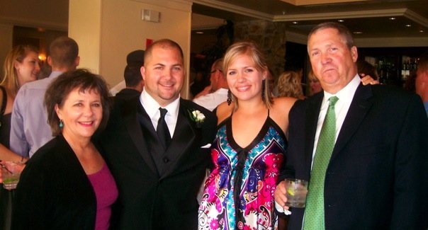 From left: my mom, my brother, me, and my dad at a friend's wedding in 2009