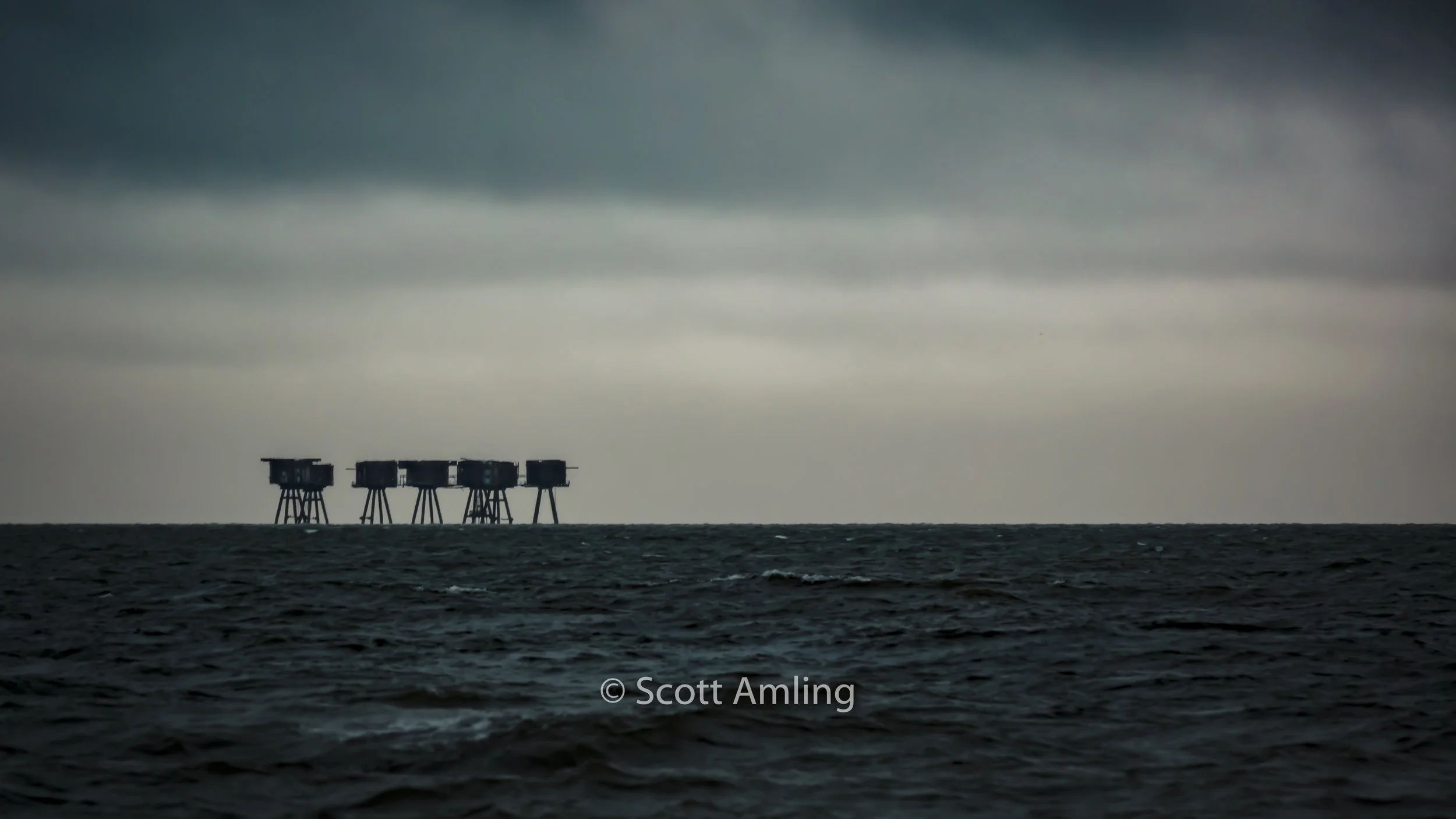 Maunsell Forts from a distance heading back to Whitstable Harbour, England (at sunset)