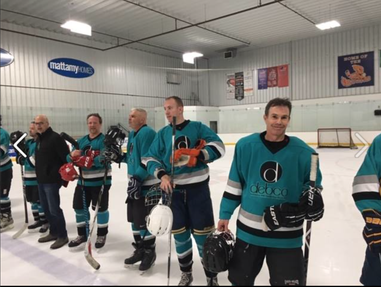 Smiling for the camera after a terrific game. {far right: Jamie Brougham}