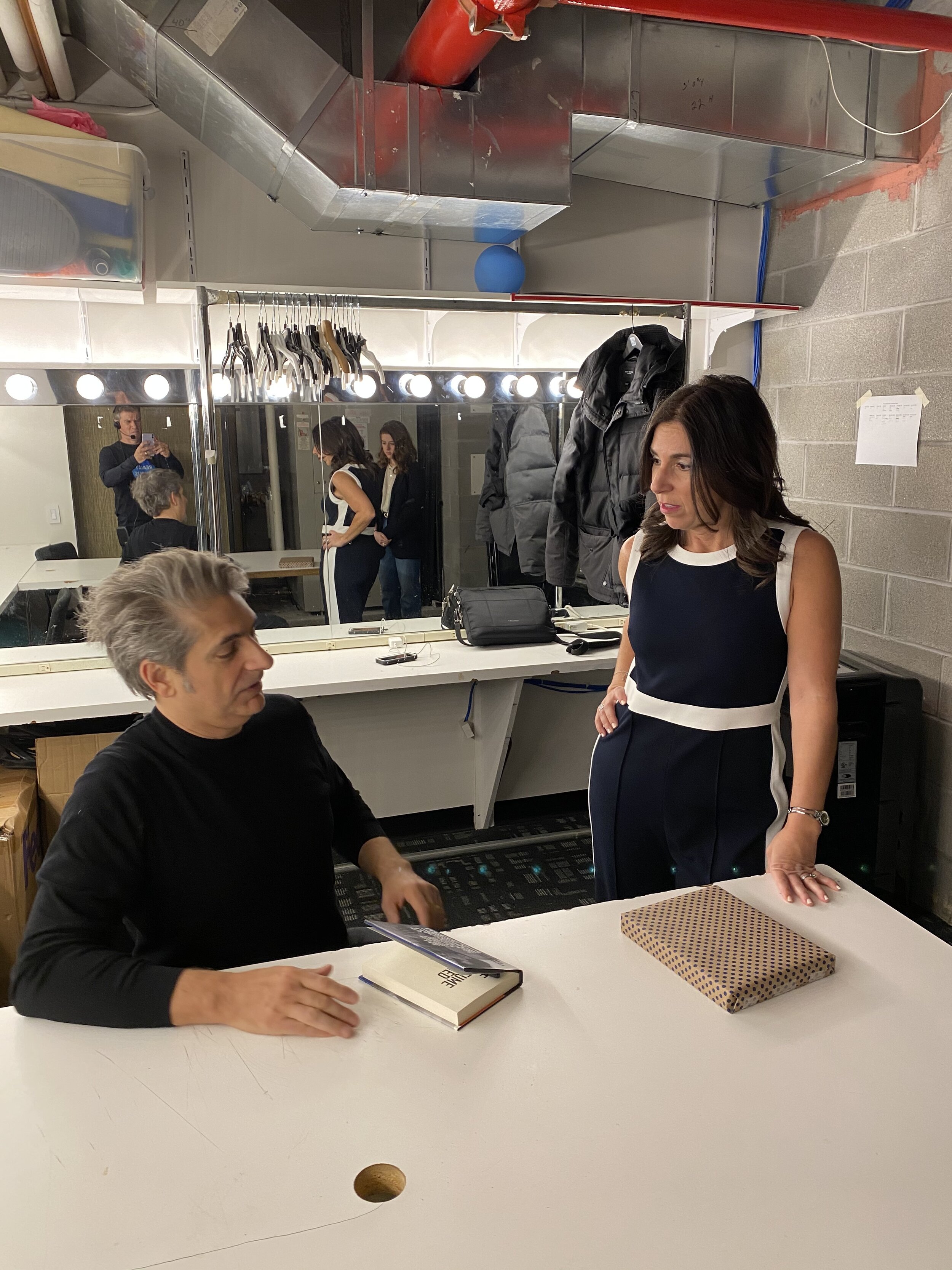 Michael Imperioli and Kara Mayer Robinson in Michael's dressing room talking books.JPG