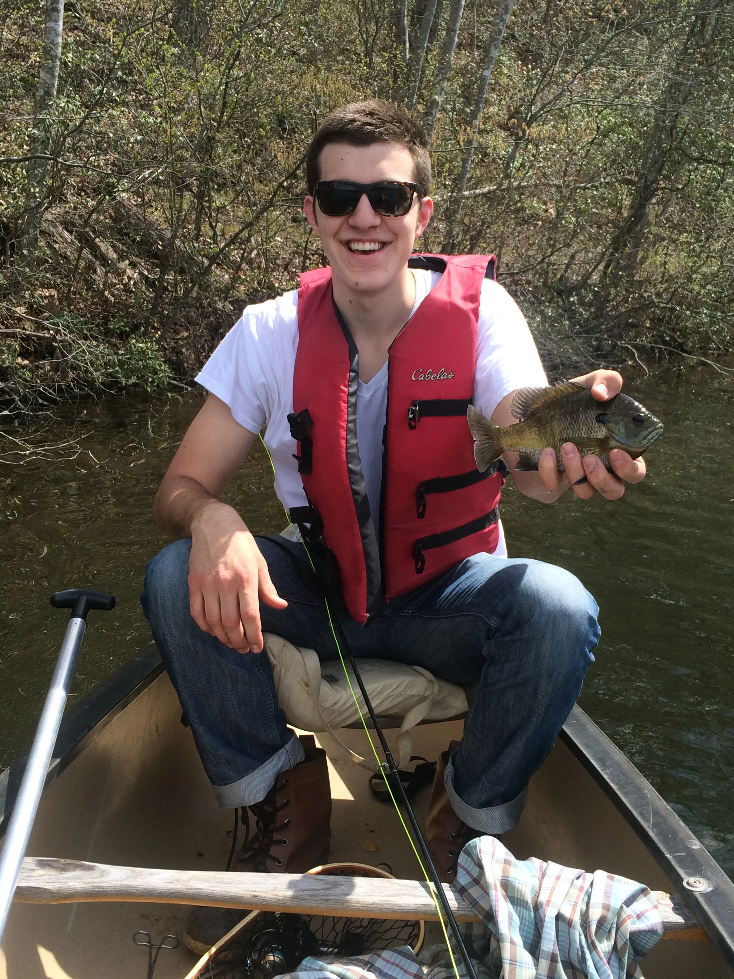 A teenage me holding the species of fish that got me into the fly fishing game. These fish will always be a blast to catch!